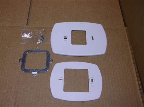 THERMOSTAT COVER PLATE ASSEMBLY 